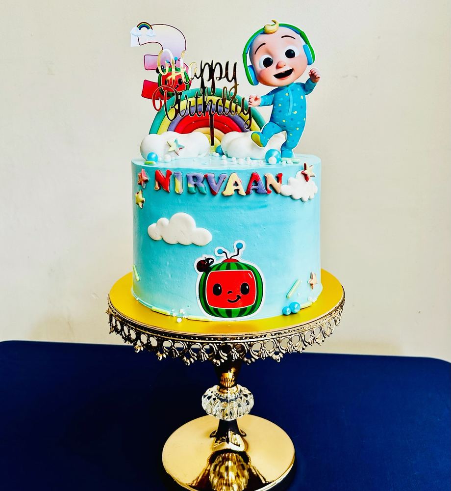Sky-blue Cocomelon-theme birthday cake